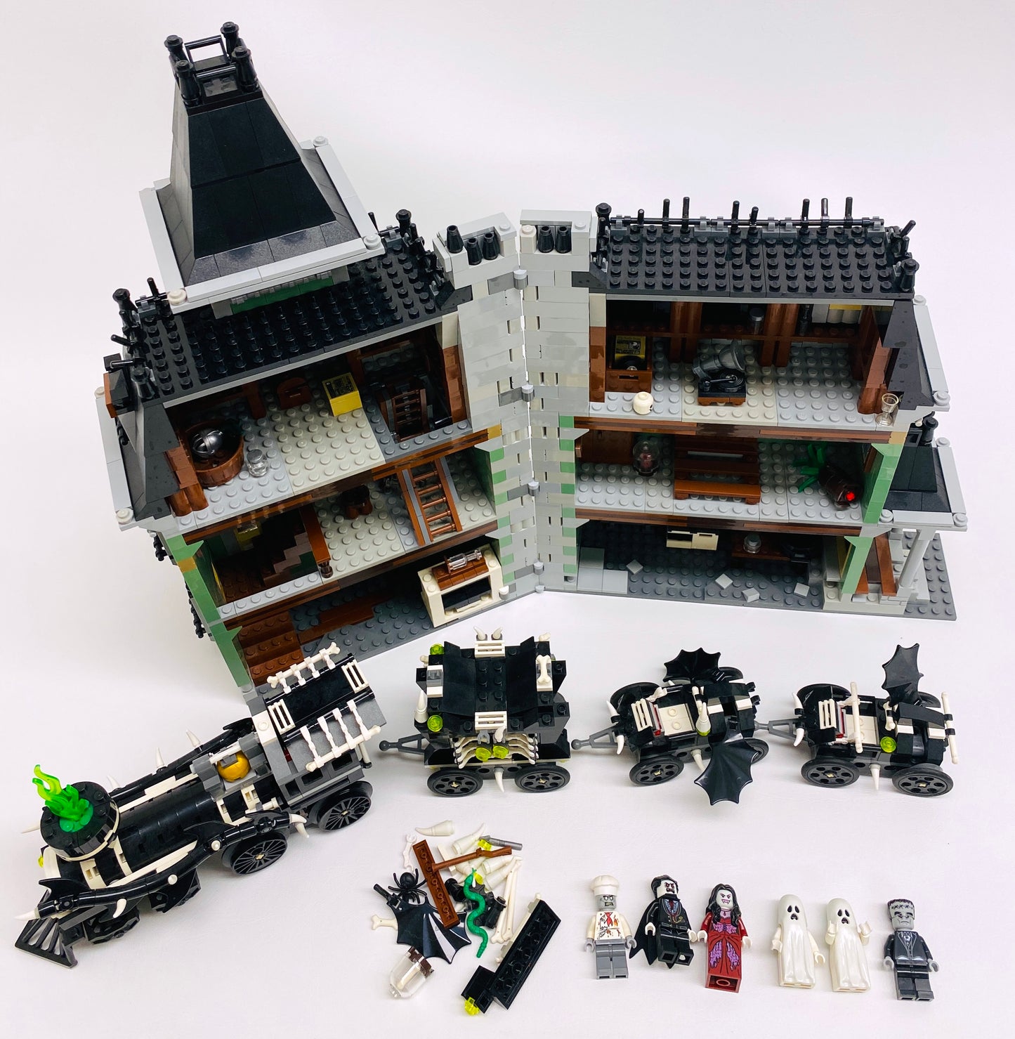 LEGO Monster Fighters Haunted House Set #10228 with Minifigures and Free Ghost Train!