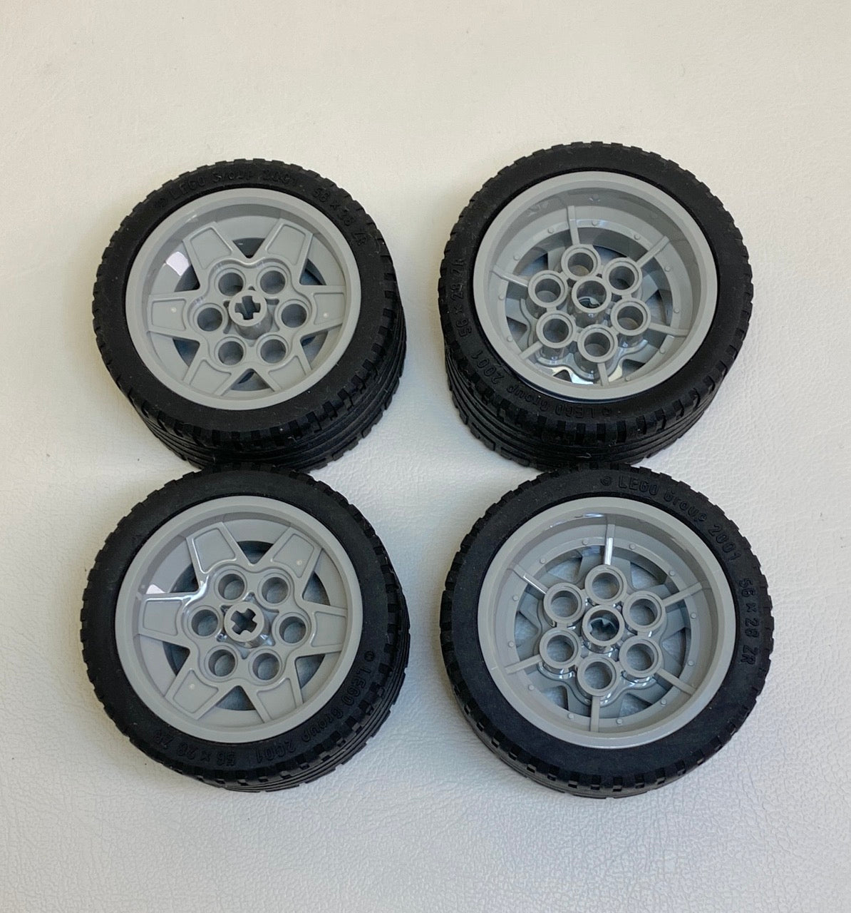LEGO Technic Tyre 56x28 ZR Pack of 4 with Light Bluish Grey Hubs