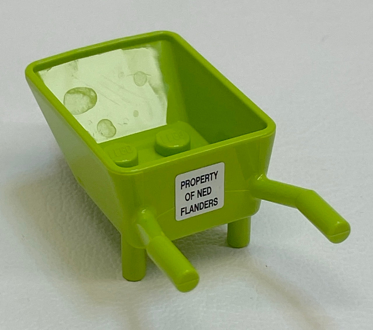 LEGO The Simpsons Minifigure Wheelbarrow with "PROPERTY OF NED FLANDERS" Sticker