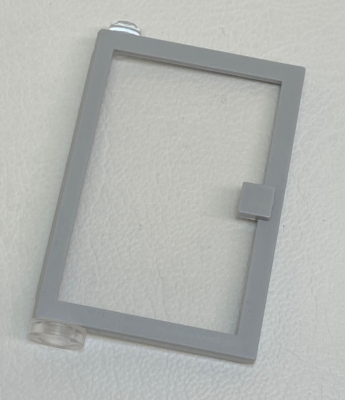 LEGO Light Bluish Grey Door 1 x 4 x 5 Left with Fixed Trans-Clear Glass