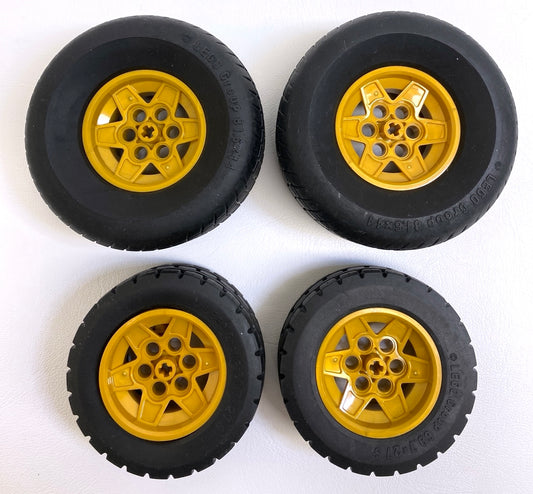 LEGO Technic Tyre 81.6x44 and 68.7x27S Black with Pearl Gold Hubs