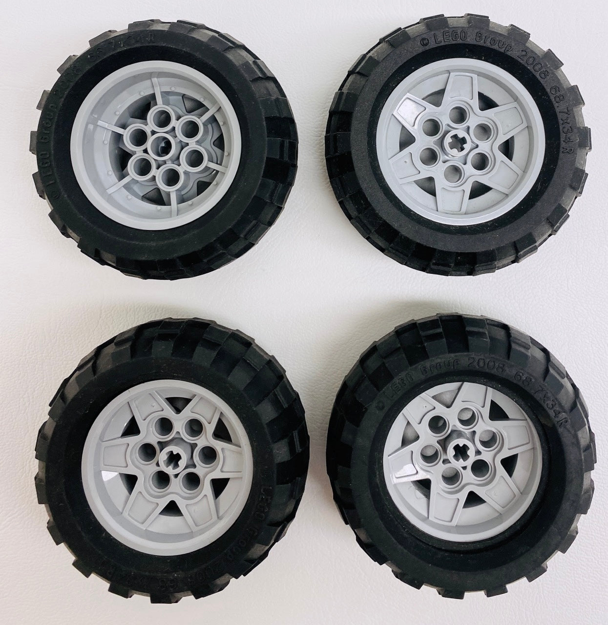 LEGO Technic Tyre 68.7x34R Pack of 4 with Light Bluish Grey Hubs